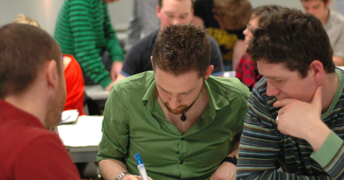 A photo of me at a design process workshop on my Master's degree